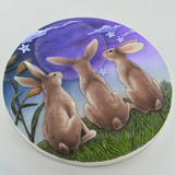 Three Moongazing Hares On Hilltop With Night Sky On Plaque