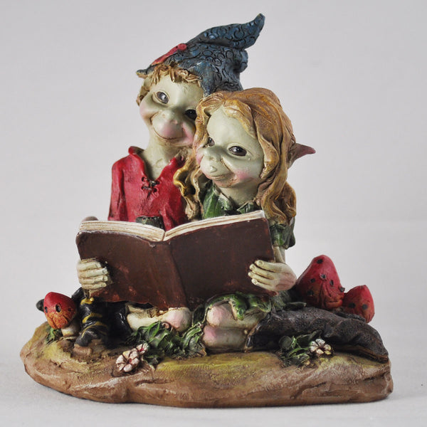 Pixie Couple Reading a Book by Tony Fisher - Prezents.com