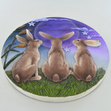 Three Moongazing Hares On Hilltop With Night Sky On Plaque
